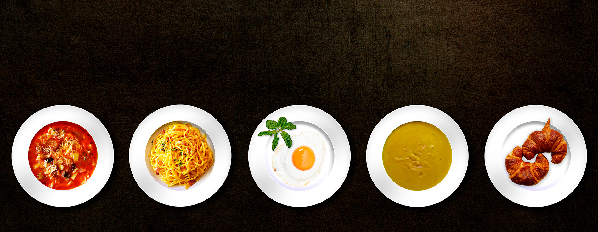 platos de comida en fondo negro